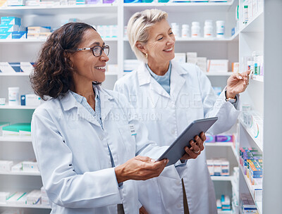 Buy stock photo Tablet, teamwork and pharmacist check stock in pharmacy, drugstore or medication shop. Medicine, technology and medical doctors or happy senior women with touchscreen for checking product inventory.