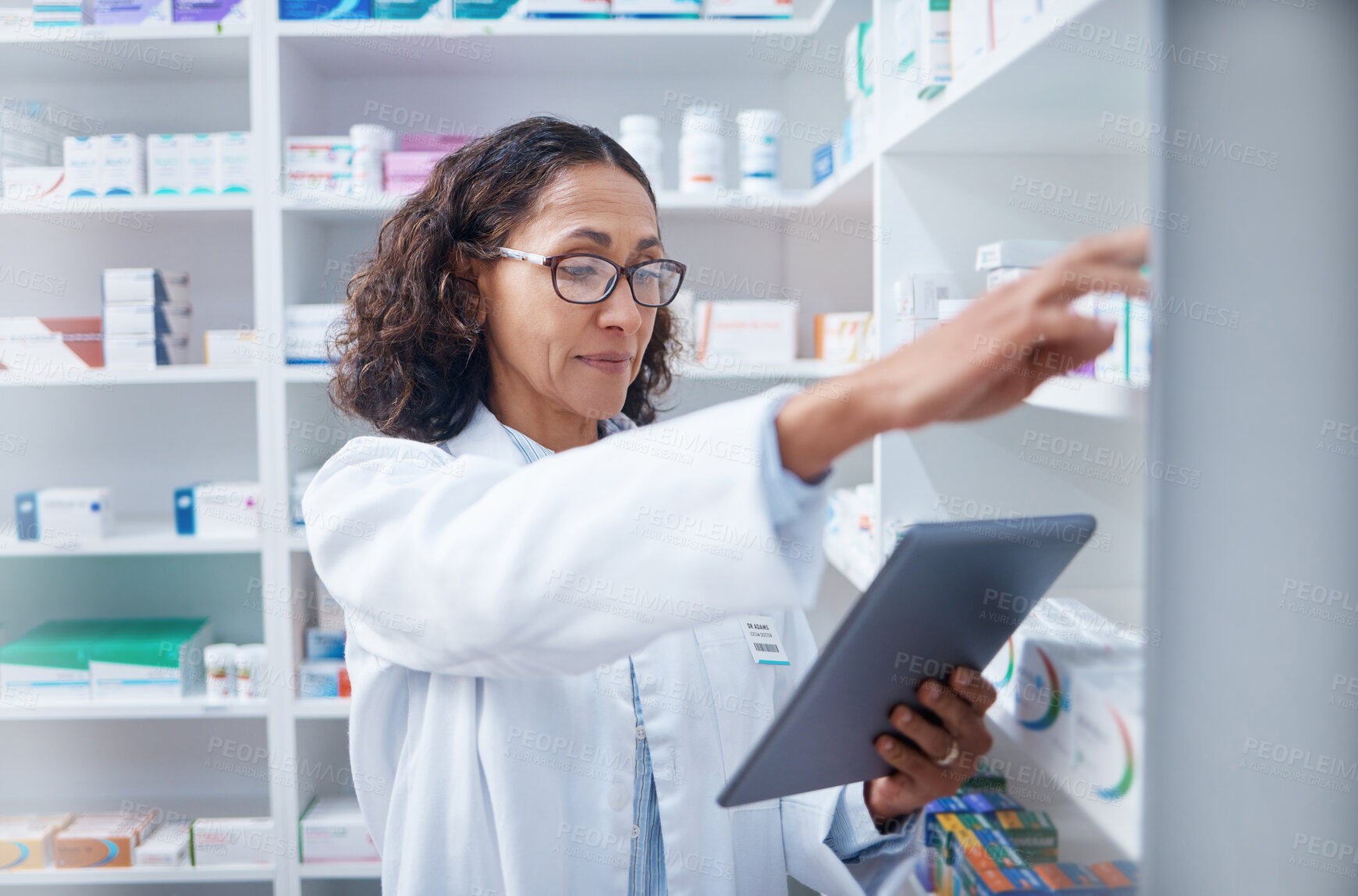 Buy stock photo Senior woman, tablet and pharmacist stock check in pharmacy for healthcare medicine in drugstore. Medication, technology and female medical doctor with touchscreen for checking inventory in shop.