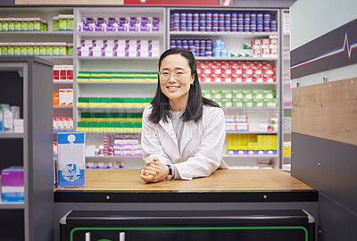 Buy stock photo Pharmacy, smile and portrait of asian woman at counter in drugstore, customer service and medical advice in Japan. Prescription drugs, happy pharmacist and inventory of pills and medicine at checkout