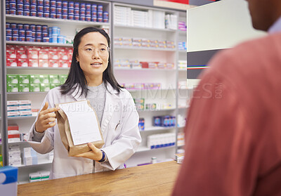 Buy stock photo Medicine, pharmacist or doctor with patient in store with mockup prescription package for healthcare. Pharmacy woman giving man pills, advice and Pharma product for medical help, health and wellness