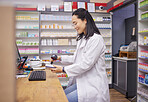 Pharmacy, help and asian woman at checkout counter for prescription drugs scanning medicine. Healthcare, pills and pharmacist from Japan with medical product in box and digital scanner in drugstore.