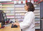 Order, consultation and pharmacist typing on a computer for an email, communication and medicine. Healthcare, medical and woman on a hospital pc for information on pills, health and consulting