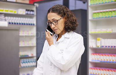 Buy stock photo Phone call, pharmacy and medicine with a woman taking an order in a drugstore for prescription or treatment. Mobile, contact and healthcare with a female pharmacist talking in a hospital dispensary