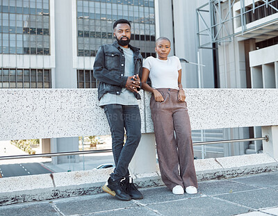 Buy stock photo Date, urban and portrait of an African couple in the city for fashion, weekend fun and vacation. Fashionable, serious and black man and woman standing on a bridge for bonding and time in South Africa