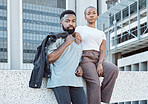City, urban fashion and portrait of black couple with love, care and date together. Cool street style of young man, woman and people in relationship to relax outdoor for freedom at town buildings 