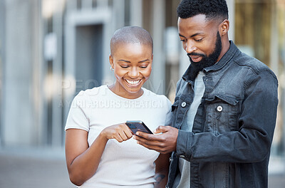 Buy stock photo City, happy and couple browsing on a phone with social media, mobile app or the internet. Technology, 5g network and young African man and woman scrolling on a website with a cellphone in town.