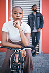 Bicycle, portrait and couple of friends for city travel, streetwear fashion and urban gen z lifestyle. Face of a confident black woman or cool people with a bike in urban sidewalk for youth cycling