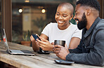 Cafe, social media and dating with a black couple laughing together at a table in a restaurant. Humor, love or date with a man and woman looking at a meme on a phone while bonding in a coffee shop