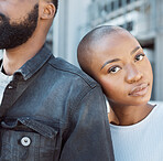 Portrait, fashion and city with a black couple outdoor together for urban or street style in the day. Face, love or clothes with a young woman resting her head on the shoulder of a stylish man