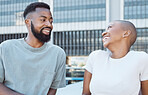 Laughing, black people and joke from couple of friends in a city with happiness and conversation. Urban lifestyle, happy woman and communication by a building with partner and smile from discussion