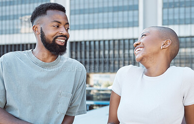 Buy stock photo Laughing, black people and joke from couple of friends in a city with happiness and conversation. Urban lifestyle, happy woman and communication by a building with partner and smile from discussion