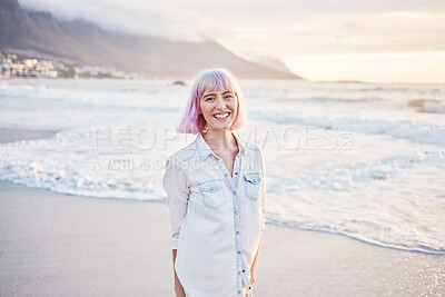 Buy stock photo Sunset, beach and portrait of woman with smile on face, having fun in waves while on holiday in Indonesia. Sea, freedom and travel, happy gen z girl playful on summer ocean vacation on evening walk.