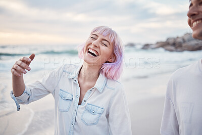 Buy stock photo Happy, beach and vacation with a couple walking on the sand together by the ocean or sea for fun. Smile, humor or joking with a woman and man enjoying a funny joke while bonding on the coast