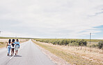 Girl friends, road trip and street walking of girls back on a vacation adventure with mockup. Countryside, travel and holiday freedom of women together on walk break in summer together feeling free