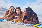 Girl friends, ocean fun and phone of a teenager laughing at funny meme by the sea in Miami. Travel, vacation and sunshine with happy students enjoying spring break with mobile app lying on sand 