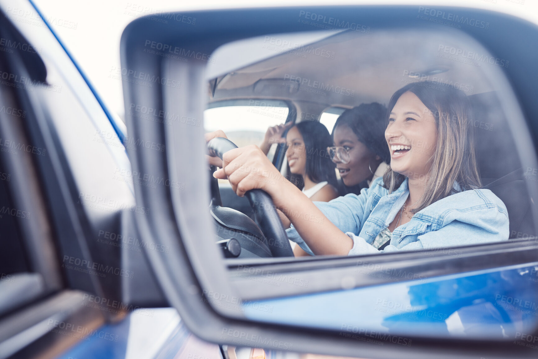 Buy stock photo Happy, mirror and friends with women in car driving for road trip, vacation and transportation. Summer break, travel and smile with reflection of girl driver on holiday for journey, fun and weekend