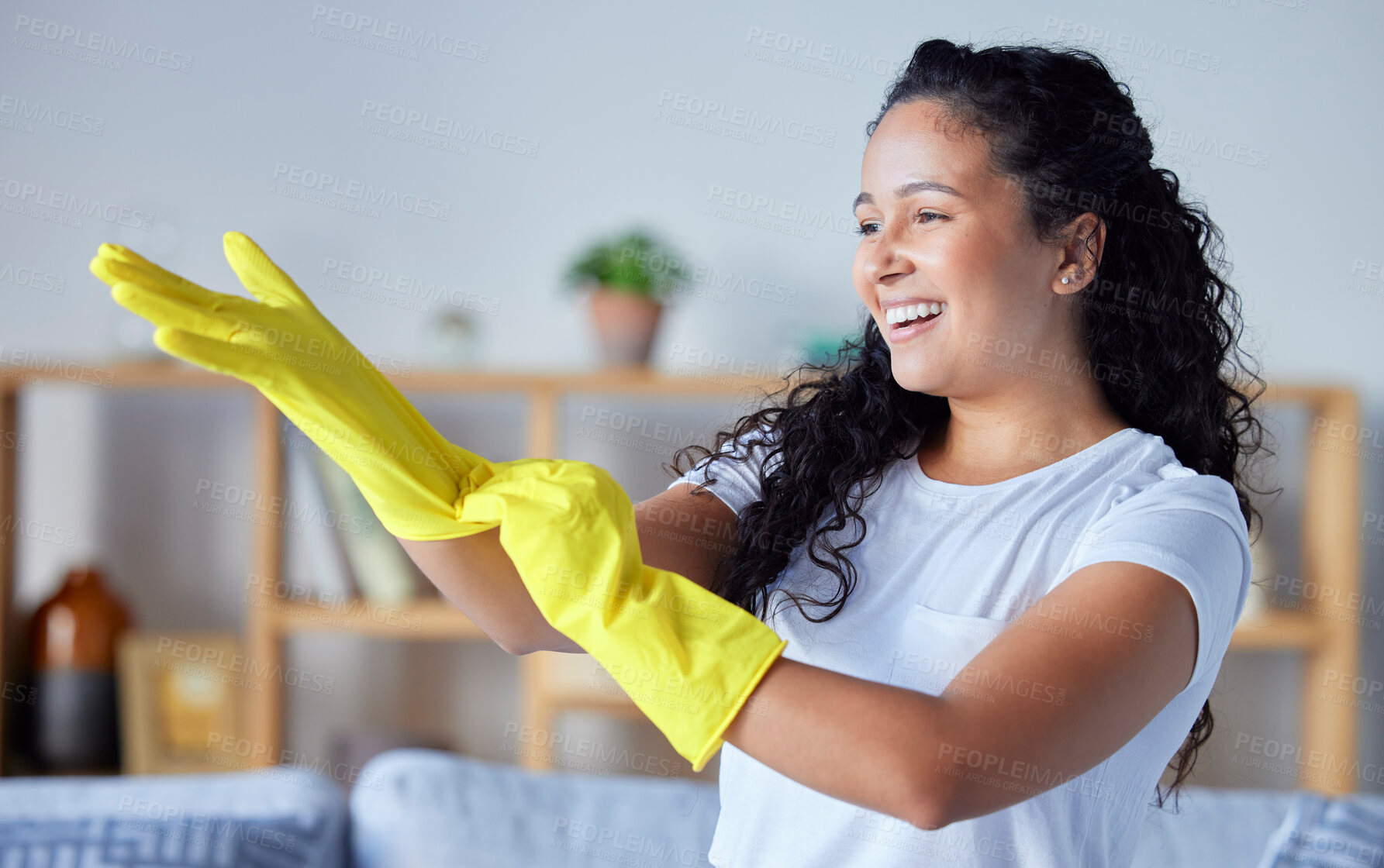 Buy stock photo Cleaning, gloves and hygiene with a black woman cleaner in her home for housekeeping or chores. Hands, bacteria and health with a happy young female in a house working as a domestic housekeeper