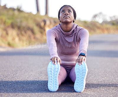 Fitness, stretching and running with black woman in road for jogging, workout and cardio exercise. Training, health and marathon with runner in street and legs warm up for wellness, sports and goal