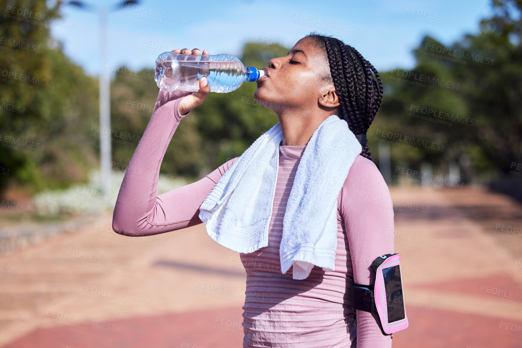 Buy stock photo Fitness, black woman and drinking water for hydration, training and exercise for wellness, healthy lifestyle and workout. African female athlete, lady and runner with bottle, aqua and liquid for rest