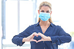 Business, heart and portrait of a woman with covid, care and emoji for a pandemic at work. Healthcare, safety and corporate employee with a love hand gesture while wearing a face mask during corona
