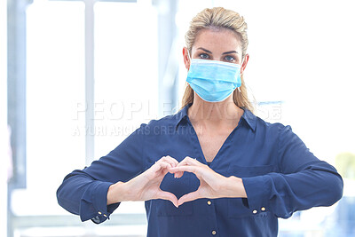 Buy stock photo Business, heart and portrait of a woman with covid, care and emoji for a pandemic at work. Healthcare, safety and corporate employee with a love hand gesture while wearing a face mask during corona