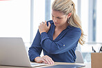 Business woman, laptop and shoulder pain suffering from work injury, accident or ache at the office desk. Female employee holding painful area in discomfort, sore or bruised bone at the workplace