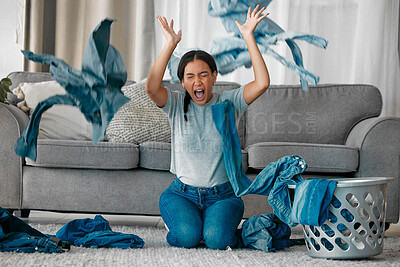 Buy stock photo Laundry, angry and woman with clothes in air frustrated from cleaning, housekeeping and housework. Burnout, washing basket and upset, stressed and shouting female maid in living room throw clothing