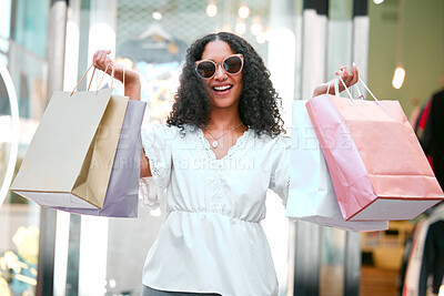 Buy stock photo Shopping bags, happy and woman with sunglasses in the city for a sale, discount or promotion. Happiness, smile and portrait of female customer enjoying retail fashion shop spree in the street in town