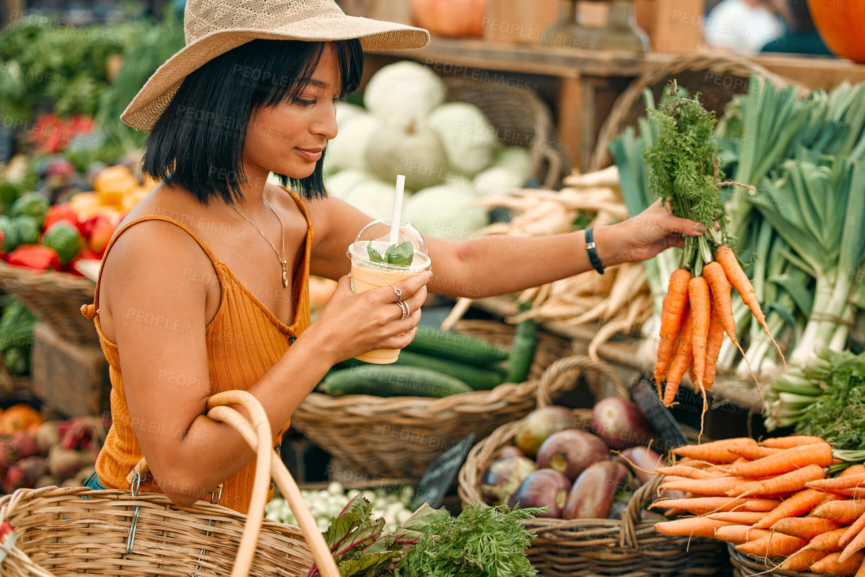 Buy stock photo Vegetables, market and black woman shopping for grocery, natural and vegan food at small business. Farm supplier, carrot and young person or customer with basket for retail product, nutrition or diet