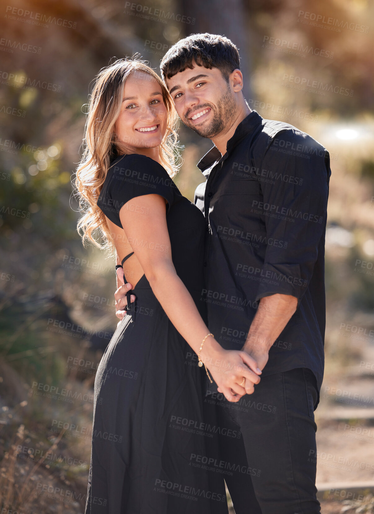 Buy stock photo Portrait, love and real couple holding hands with smile in celebration for marriage commitment. Bonding, man and happy woman embrace with happiness, romance and trust on honeymoon vacation