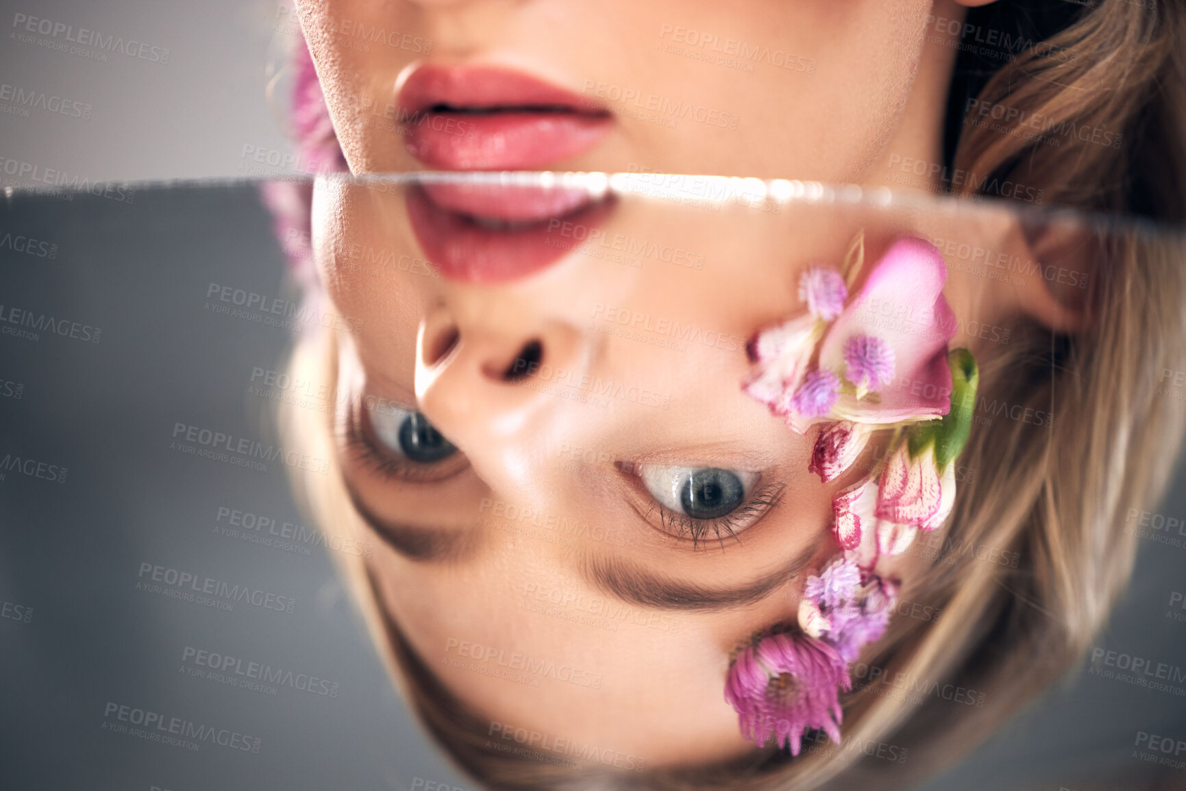 Buy stock photo Beauty, mirror face and model with flower product, sustainable agriculture and natural skincare reflection. Facial makeup, nature plant cosmetics and eco friendly woman isolated on studio background