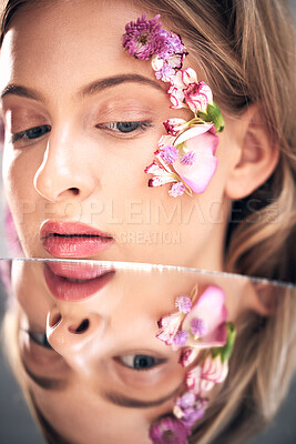 Buy stock photo Beauty face, mirror reflection and model with flower product, sustainable agriculture and natural skincare. Facial makeup, nature plant cosmetics and eco friendly woman isolated on studio background