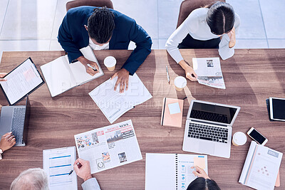 Buy stock photo Meeting, top view or business people planning a team or group project documents on office desk or table. Collaboration, corporate or focused employees working on data analytics paperwork or strategy 