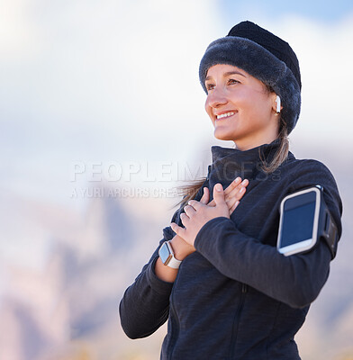 Buy stock photo Hands on chest, health and fitness with woman outdoor, peace and zen with fresh air, run and phone, earpods for music. Calm, nature view and 5g, happy runner or hiking, smartwatch and mockup space