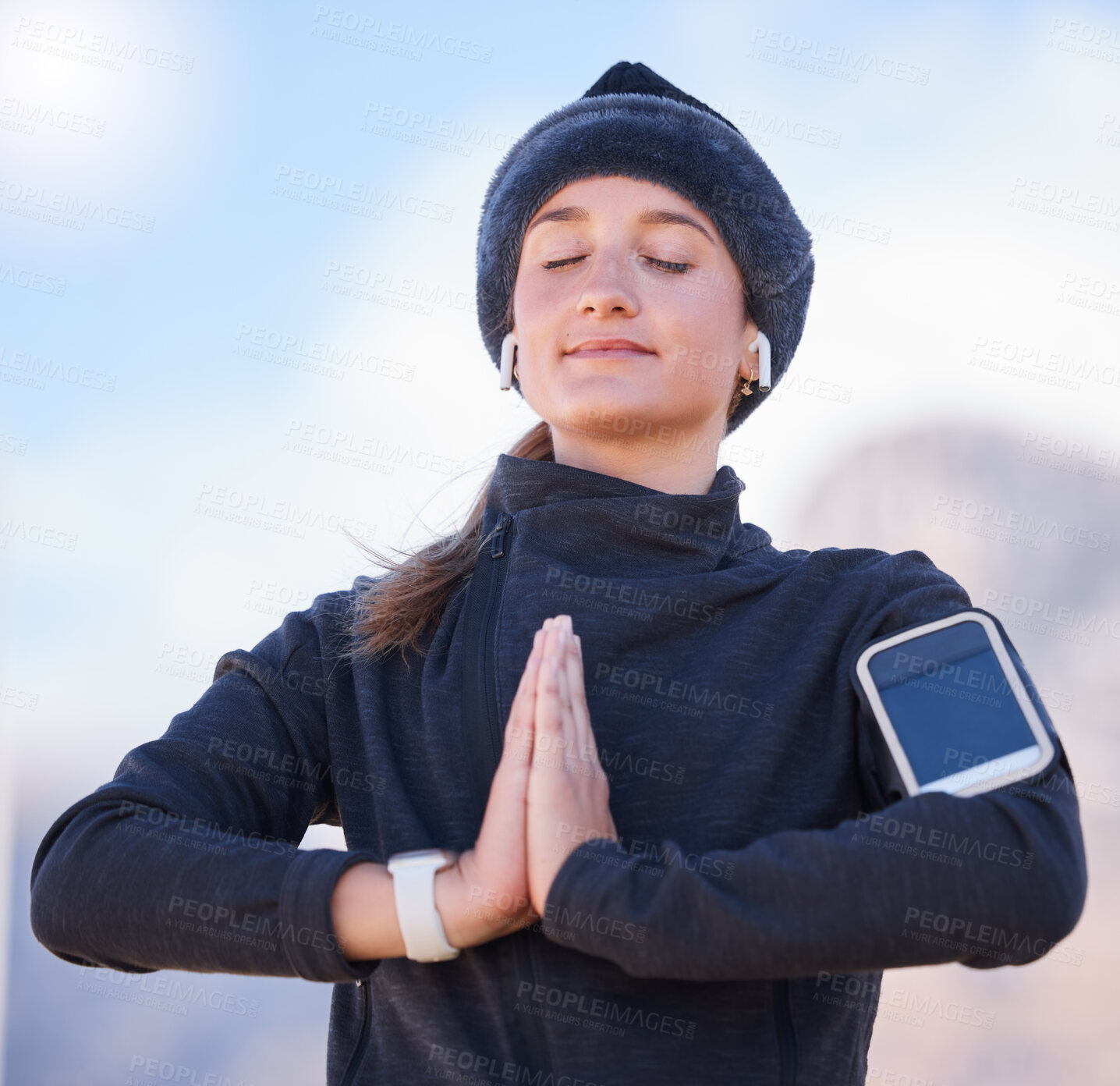 Buy stock photo Woman, praying hands and training at park, city or focus on meditation, breathing and start morning exercise. Gen z runner girl, smartphone and outdoor with peace for mindfulness, health and wellness