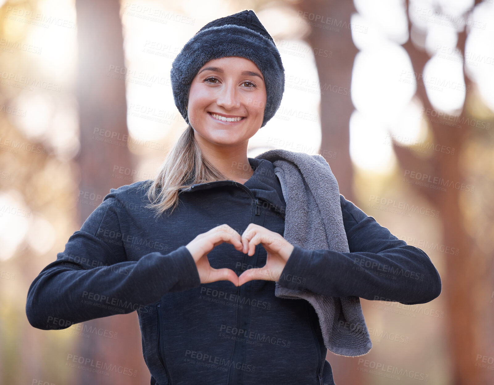 Buy stock photo Portrait, heart hands and smile of woman hiking outdoors for wellness and fitness. Valentines day, love emoji and happy female with hand gesture for romance affection, support or empathy in winter.