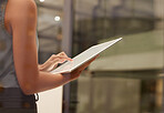 Hands, tablet and research with a business woman in the office for planning or strategy next to mockup. Internet, data and innovation with a female employee standing at work for company growth