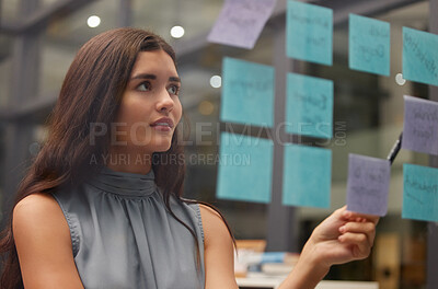 Buy stock photo Business, woman and thinking for brainstorming, planning or lady with ideas for opportunity. Corporate, female employee or manager with sticky notes, advertising campaign or sales growth in workplace