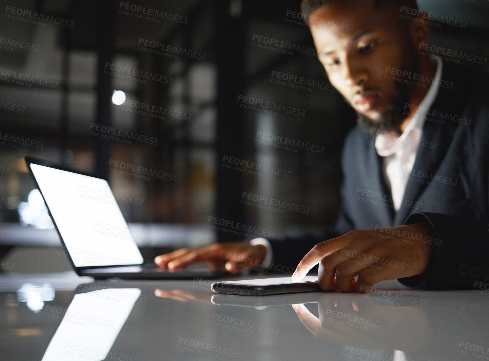 Buy stock photo Laptop screen, phone and black man at night for fintech management, trading and stock market data analysis. Finance, accounting and business person with omnichannel for global investment and mockup