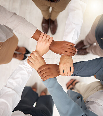 Buy stock photo Team, business people and holding hands for work community, support and teamwork. Team building, diversity and group collaboration motivation of corporate employees with solidarity and hope together