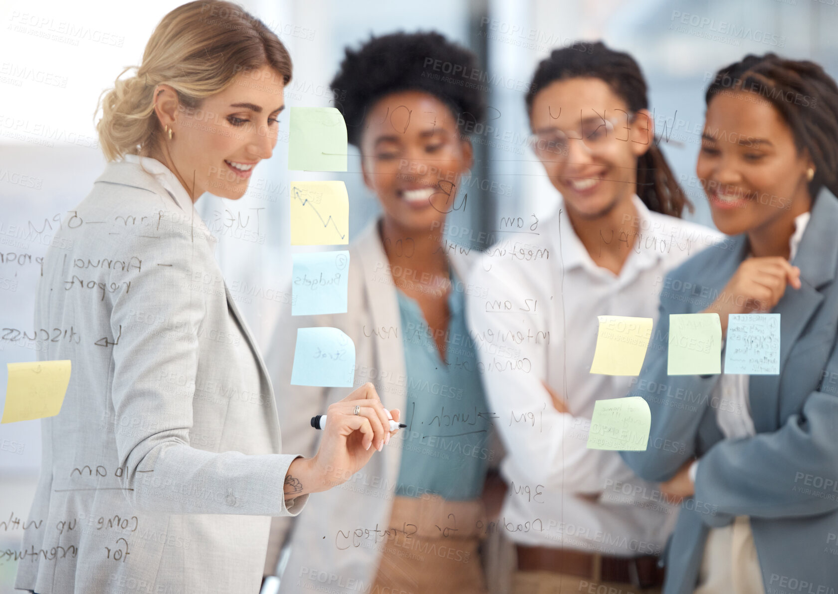 Buy stock photo Woman writing, business meeting and women team collaboration by a office board. Diversity, happiness and teamwork of corporate staff planning a content creation checklist and schedule for strategy
