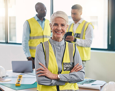 Buy stock photo Senior woman, portrait and engineering project manager with construction gear and project blueprint. Architecture team, building plans and proud elderly industrial employee with staff and smile