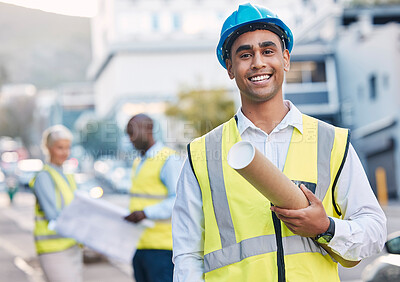 Buy stock photo Construction, architect and blueprint with man in portrait, smile and project plan at job site, contractor and happy leader. Mockup space, helmet for safety and architecture in building industry