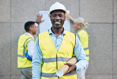 Buy stock photo Black man, architect and portrait smile with blueprint in building or construction plan on site. Happy African American male engineer or contractor smiling with floor plan for industrial architecture