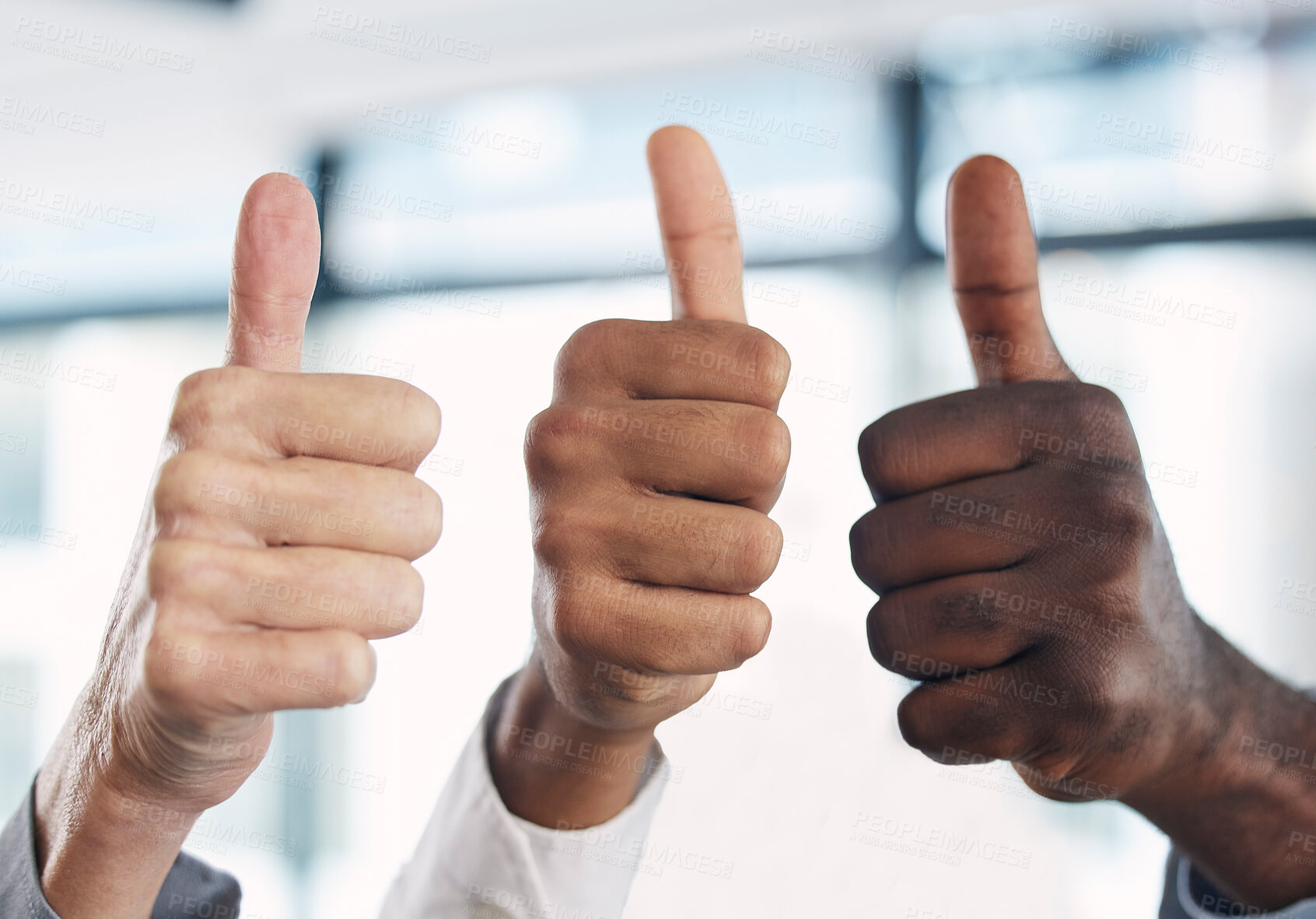 Buy stock photo Thumbs up, hands and group together in office with diversity, agreement and solidarity at job. Business people, hand sign and solidarity with team building, collaboration and motivation in workplace