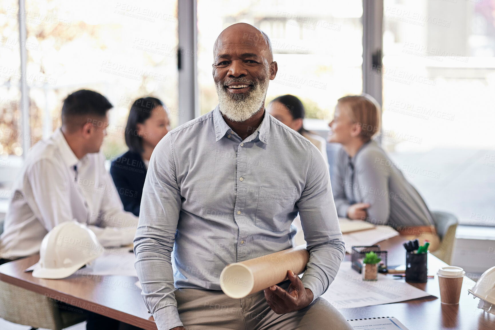 Buy stock photo Black man, architect and portrait smile with blueprint in team planning for construction or building at office. African senior leader CEO contractor or engineer with floor plan in architecture