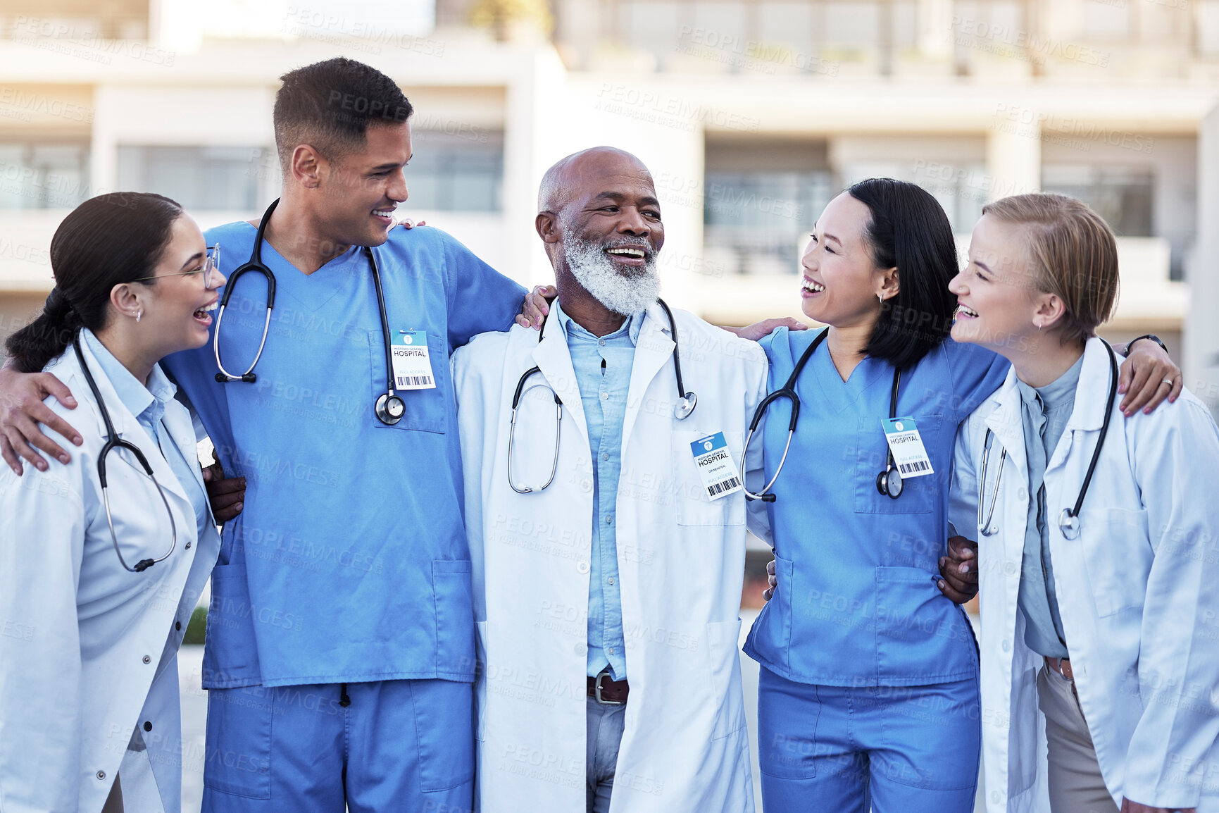 Buy stock photo Doctor, hug and smile for healthcare collaboration, partnership, unity or trust in the city. Happy group of medical team smiling and hugging in teamwork support, nursing or medicine in solidarity