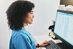Nurse, computer and black woman typing in hospital for healthcare reports or telehealth. Medical, health and happy female physician or doctor with desktop for writing, research or online consultation