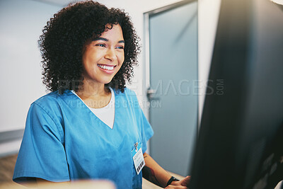 Computer, nurse and black woman typing in hospital for healthcare reports or telehealth. Medical, health and happy female physician or doctor with desktop for writing, research or online consultation