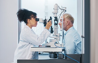 Buy stock photo Vision, eye test and insurance with a doctor woman or optometrist testing the eyes of a man patient in a clinic. Hospital, medical or consulting with a female eyesight specialist and senior male